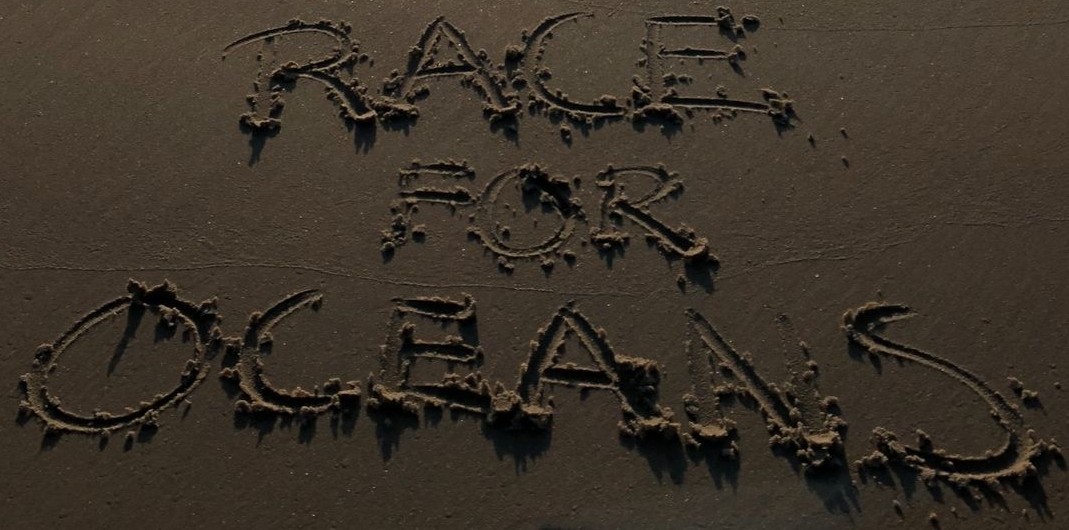 Race for Oceans relay on a sandy beach along the west coast of Jutland